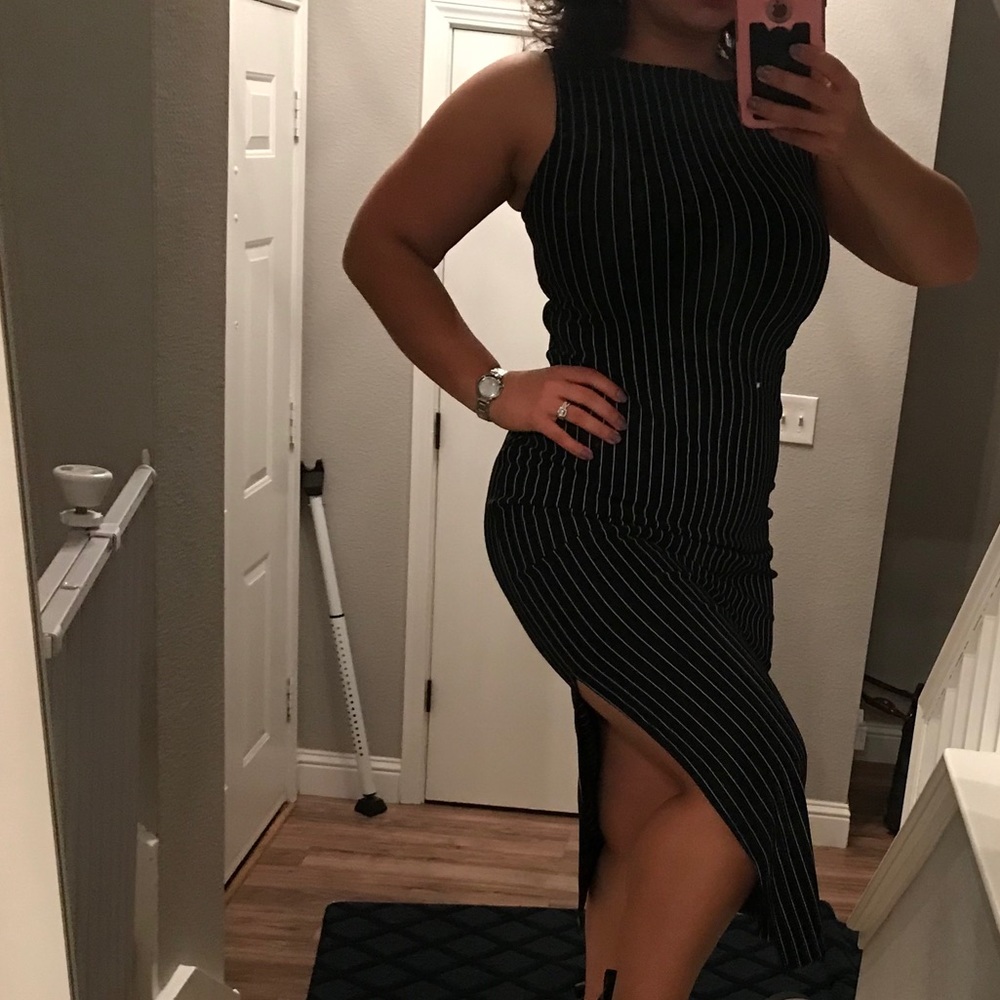 Black ankle-length dress with white pinstripes